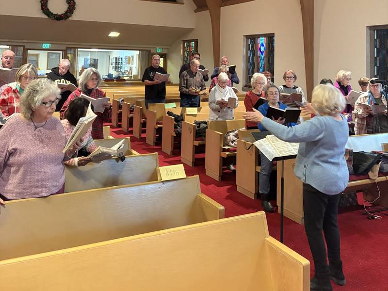Nancy Mueller conducts the choir during rehearsal for George Frideric Handel’s Messiah at St. Paul’s Lutheran Church in Streator.