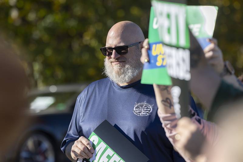 Eric McCubbin, president of the American Federation of State, County and Municipal Employees Local 817, demonstrates outside of Dixon Correctional Center Thursday, Oct. 17, 2024. AFSCME union workers are demanding safer conditions.