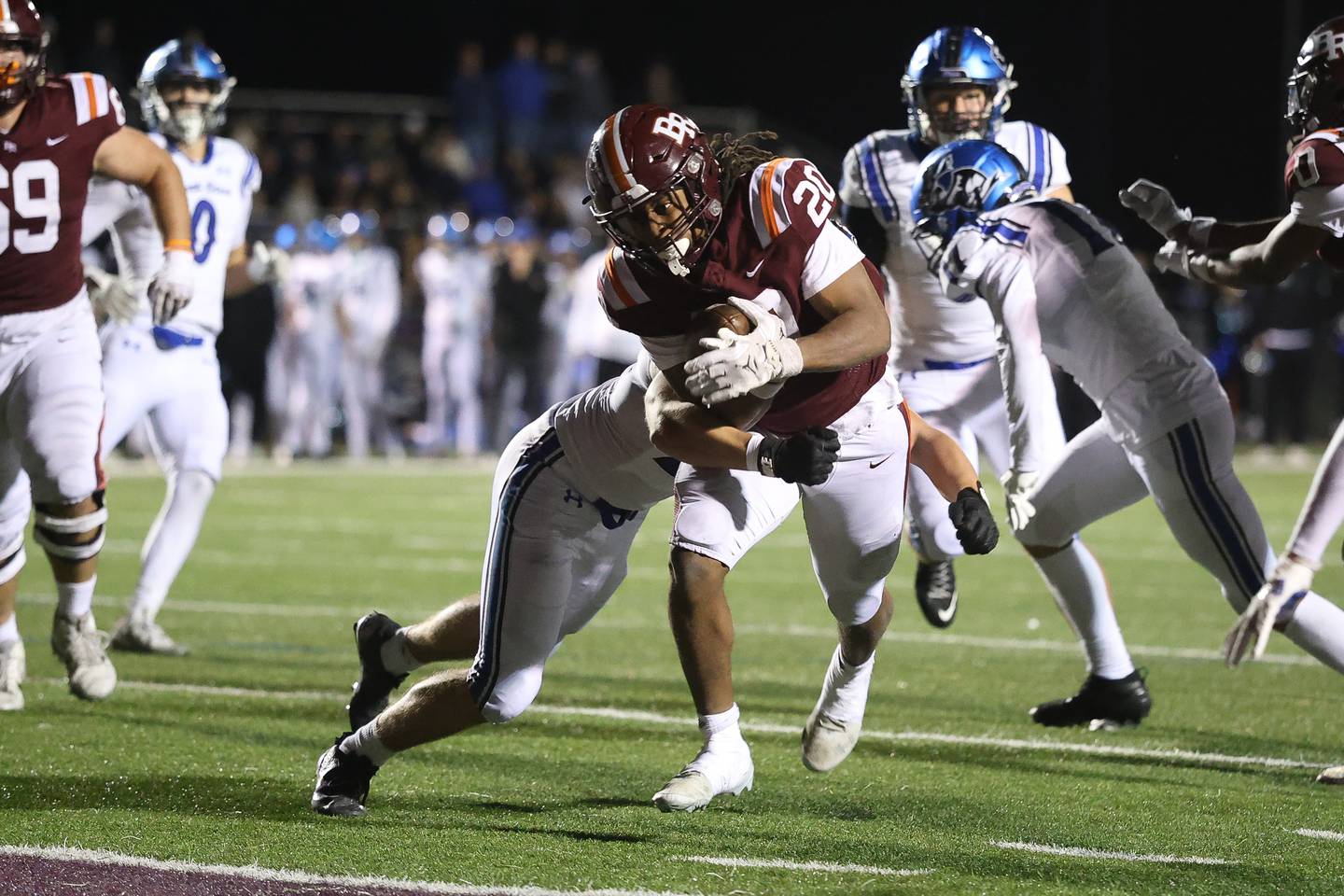 Brother Rice's Jaylin Green powers his way in for the touchdown against St. Charles North in the third round of the playoffs on Saturday, Nov. 15, 2025 in Chicago.