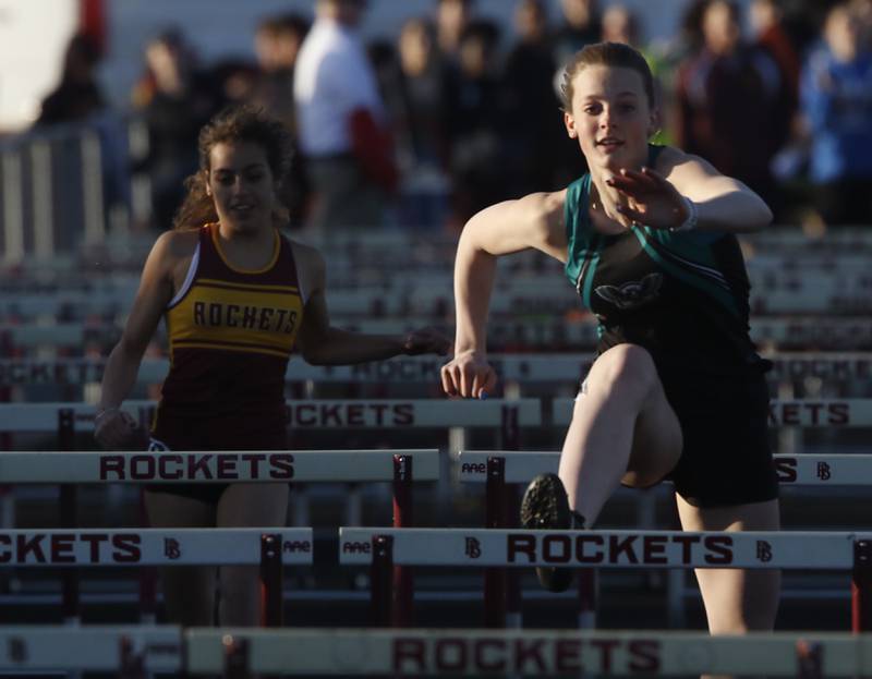 Woodstock North’s Bella Borta competes the 100 meter hurdles Thursday, April 21, 2022, during the McHenry County Track and Field Meet at Richmond-Burton High School.