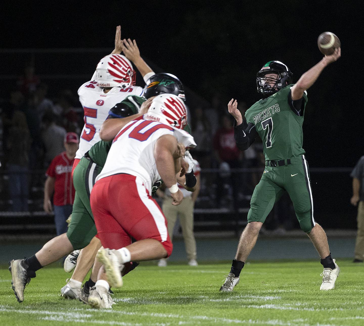 Rock Falls’ Trail Stonitsch fires a pass downfield against Oregon Friday, October 11, 2024, in Rock Falls.