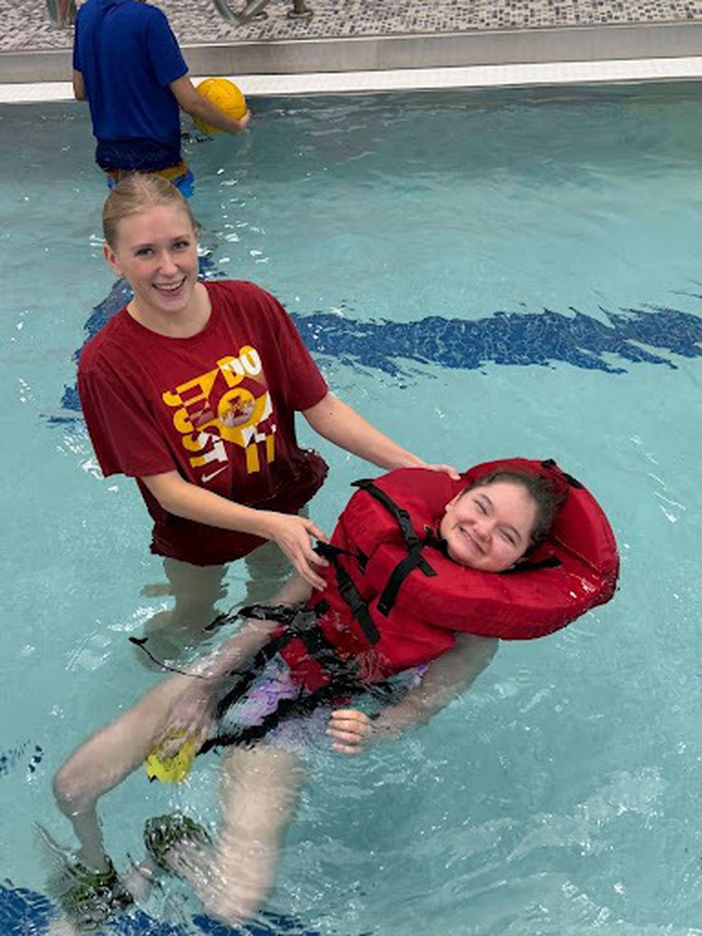 Oswego East High School students participate in the Collaborative PE Program's swim unit, supported by life vests donated by the school's Parent Teacher Organization.
