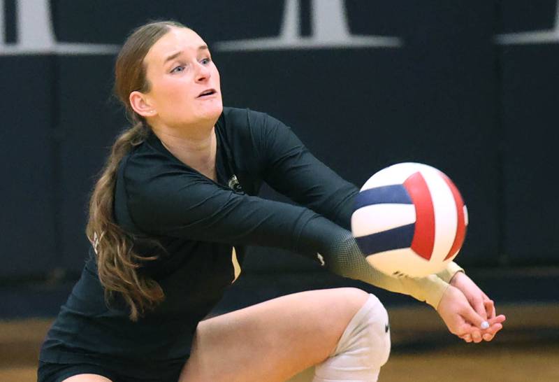 Sycamore's Sydney Fabrizius receives a Kaneland serve during their match Tuesday, Sept. 30, 2025, at Kaneland High School in Maple Park.