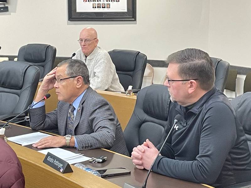 La Salle County State's Attorney Joe Navarro (lower left) tells a county committee Tuesday, Jan. 16, 2024, that a no-sanctuary resolution could mean liability for the county while Sheriff Adam Diss (right) and Chairman Don Jensen (upper left) listen. The committee heeded Navarro and directed the resolution to the Insurance Trust Committee.