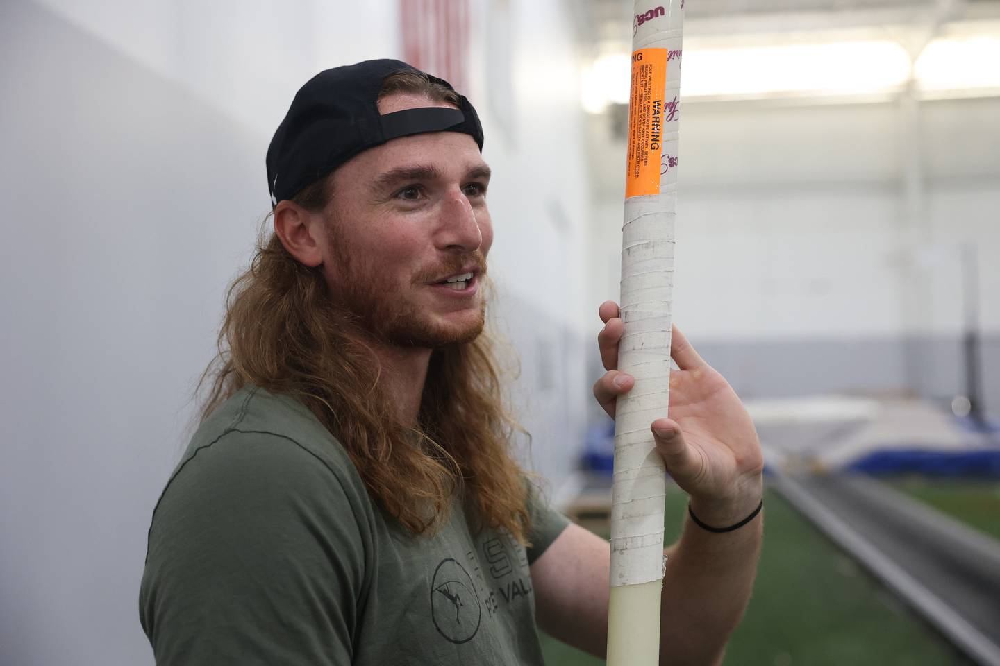 Luke Winder talks about the technique used for hold the pole for vaulting at the Rise Pole Vault training facility on Wednesday, May 29, 2024 in Joliet. Luke will be competing in the U.S Olympic trials in June, where the top three pole vaulter with my the Olympic team.