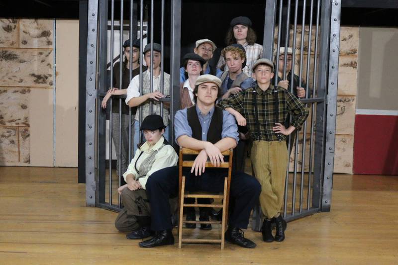 The cast of "Newsies" poses for a photo ahead of their Engle Lane show.