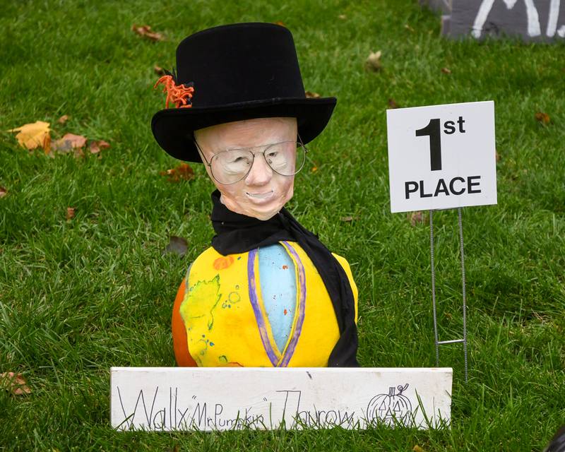 Chloe Tewksury took first in the 12-17 year old category with a sign saying the name of “Wally “Mr. Pumpkin” Thurow” during the Sycamore Pumpkin Festival on Friday Oct. 27, 2023, held at the Sycamore courthouse lawn.