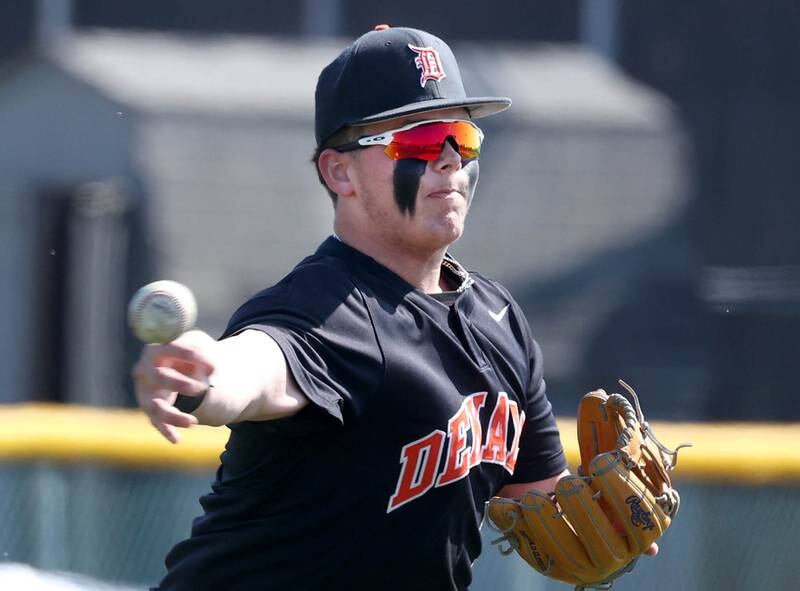 DeKalb's Isaac Black fields a bunt and throws to first during their game against Kaneland Saturday, April 12, 2025, at Kaneland High School in Maple Park.