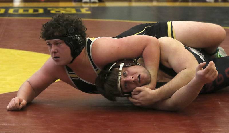 Harvard’s Riley Vest controls Marengo’s Hunter Smith their 220-pound championship wrestling match in the IHSA 1A Richmond-Burton Wrestling Regional Thursday, Jan. 19, 2023, at Richmond-Burton High School in Richmond.