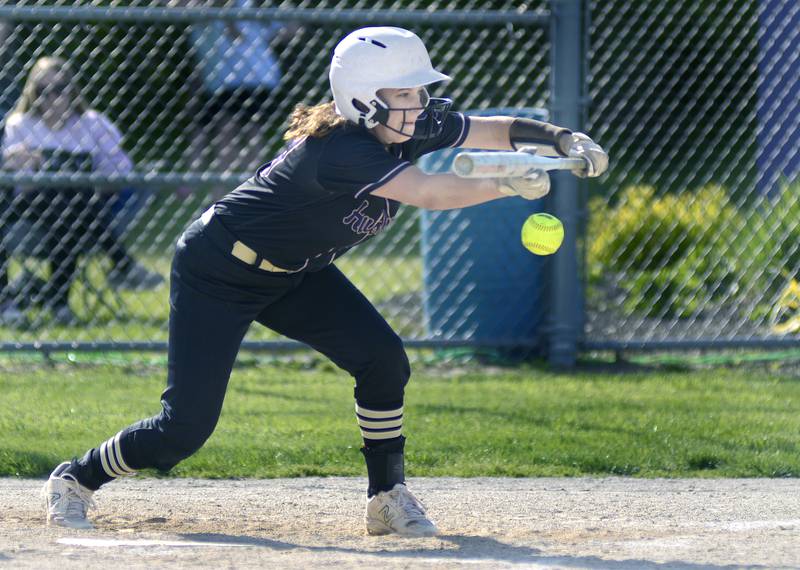 Serena’s Lanee Cole gets down a bunt to advance a runner in the fourth inning Friday against Gardner-South Wilmington at Serena.