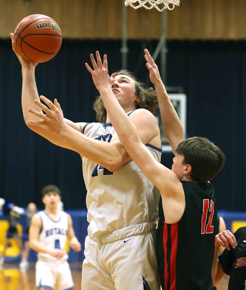 Hinckley-Big Rock's Martin Ledbetter shoots over Indian Creek's Jakob McNally during their game Tuesday, Jan. 31, 2023, in the Little 10 Conference Basketball Tournament at Somonauk High School.