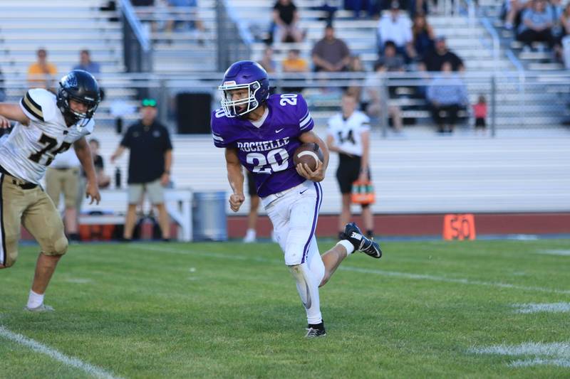 Rochelle's Braxton Bruns carries the ball during their JV football game with Lena-Winslow on Friday, Sept. 12, 2025.
