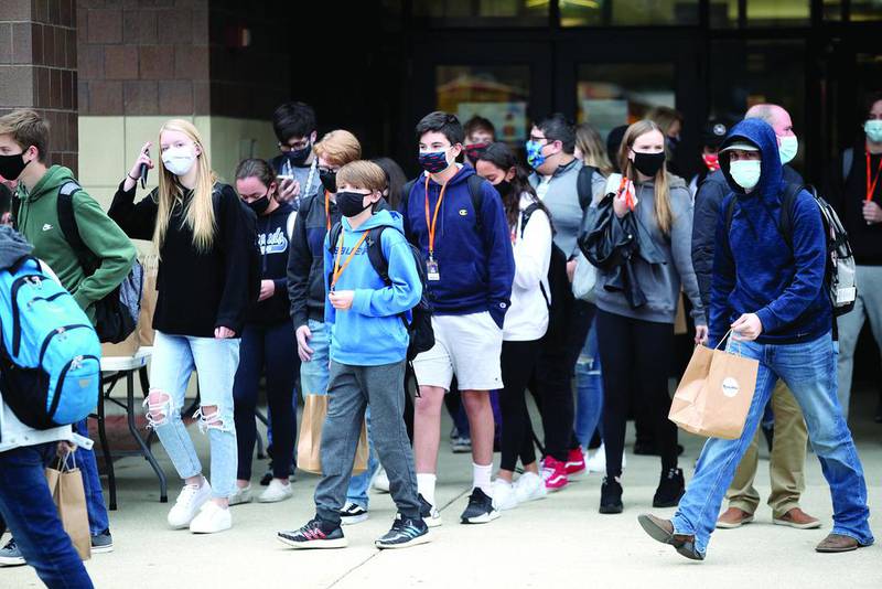 Students at St. Charles East High School are dismissed for the day after the first day of in-school learning for the 2020-21 school year on Oct. 20.