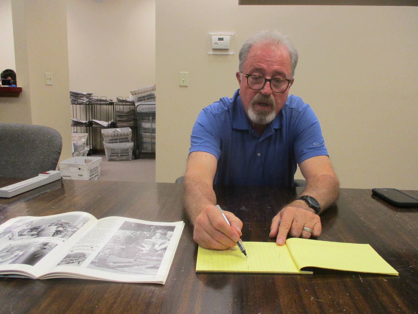 Retired Joliet firefighter Tim Carlin draws a chart showing how the new Joliet Certified Emergency Response Team is set up to respond to disasters. Aug. 22, 2025