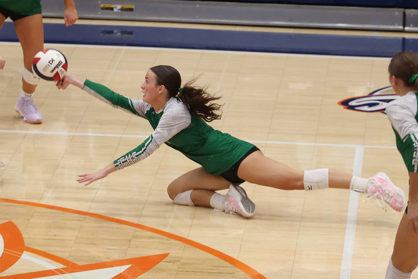 Providence’s Delaney Purtill dives for the dig against Limestone in the Class 3A Pontiac Supersectional on Monday, Nov. 11, 2024 in Pontiac.