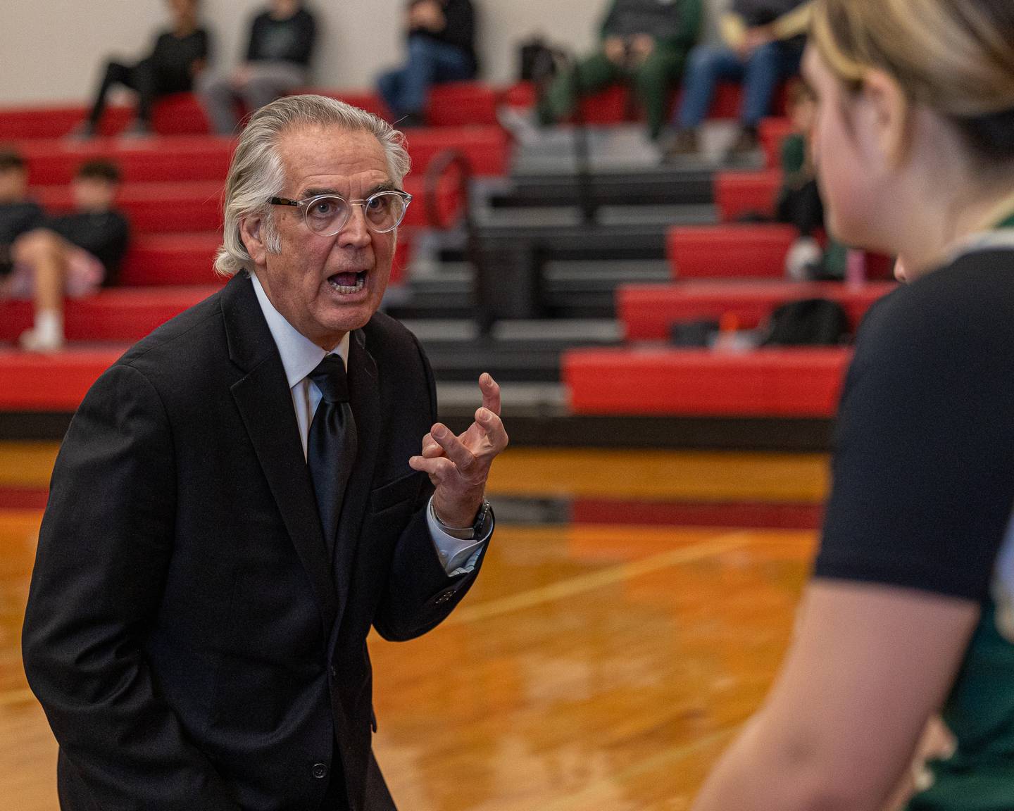 St. Bede Head Coach Tom Ptak talks to team during timeout on Saturday, January 31, 2026 at Hall High School in Spring Valley.