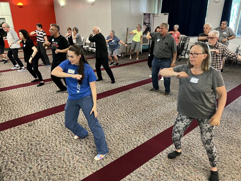 Carly Liegel, community engagement program coordinator with The Joffrey Ballet, leads a Dancing with Parkinson’s class at the Northwestern Medicine Lake Forest Health & Fitness Center