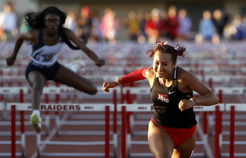 Huntley’s Sophie Amin smiles as she wins the 100 meter hurdles  during the Huntley IHSA Class 3A Girls Sectional Track and Field Meet on Wednesday, May 8, 2024, at Huntley High School.