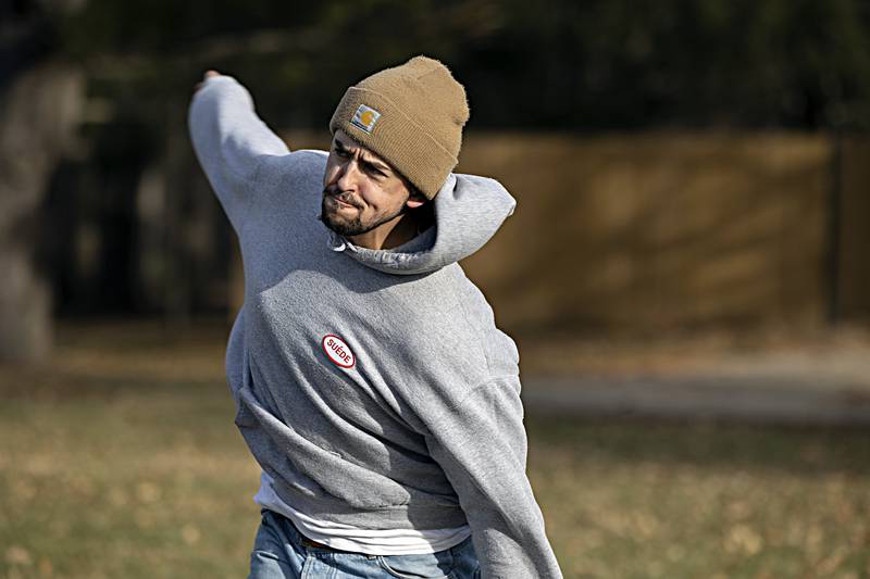 Fritiof Fagergren follows through on a drive at Sinnissppi Park in Sterling Tuesday, Dec. 19, 2023.