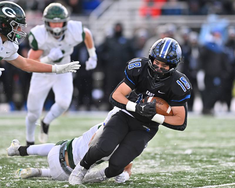 Lincoln-Way East's Jimmy Curtin (18) catches a pass for a firstdown during the IHSA Class 8A Semifinals on Saturday, November19, 2022, at Frankfort.