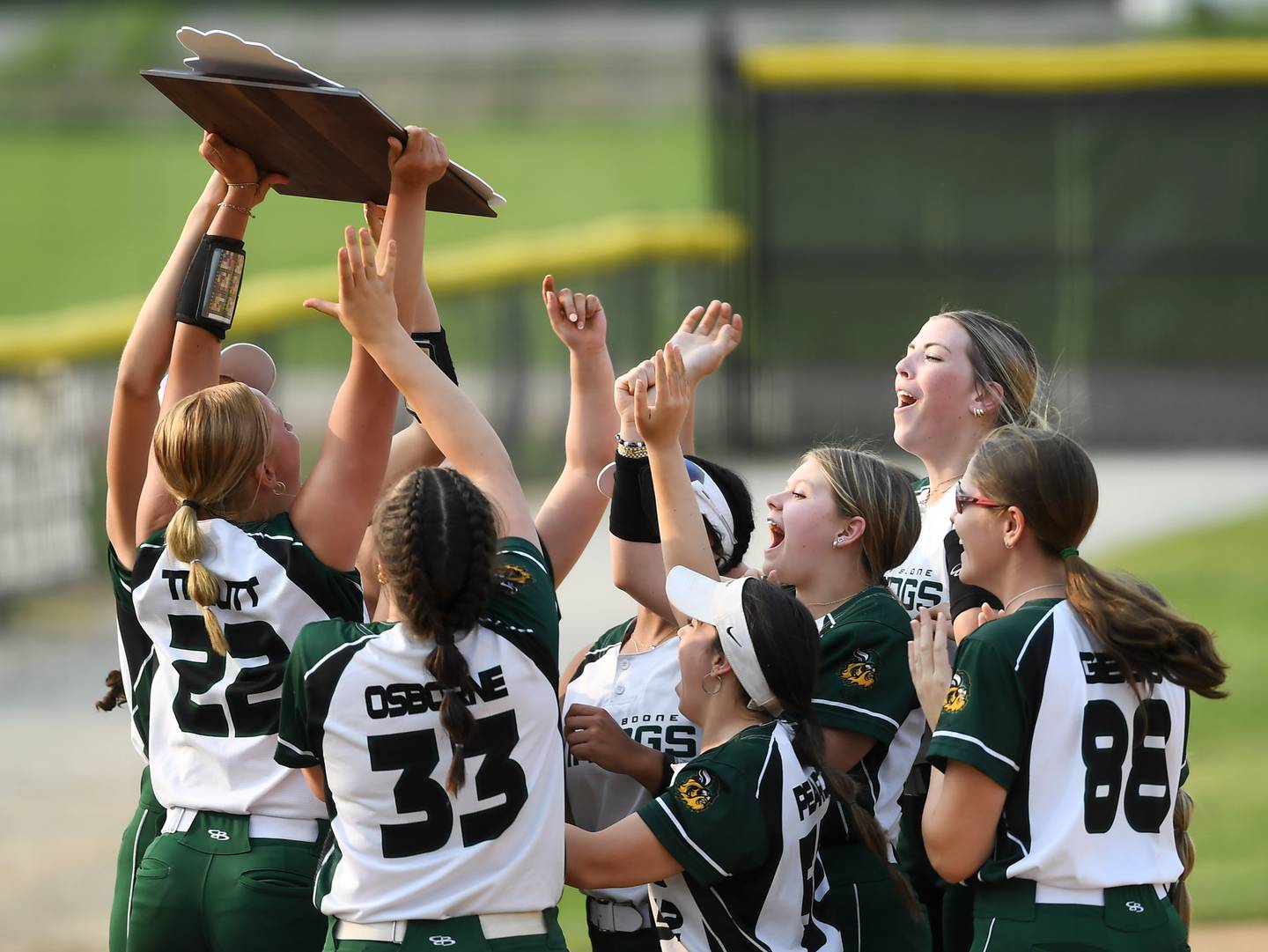 North Boone players celebrate their 7-6 victory over IC Catholic Prep during the Class 2A Benedictine University softball supersectional on Monday, June 2, 2025 in Lisle.