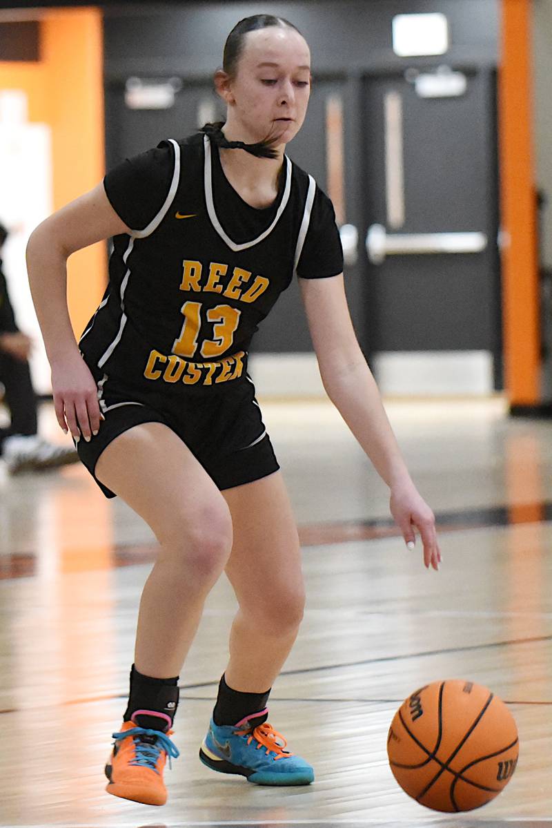 Reed-Custer's Atiana Hood drives to the basket during a game at Beecher Tuesday, Jan. 20, 2026.