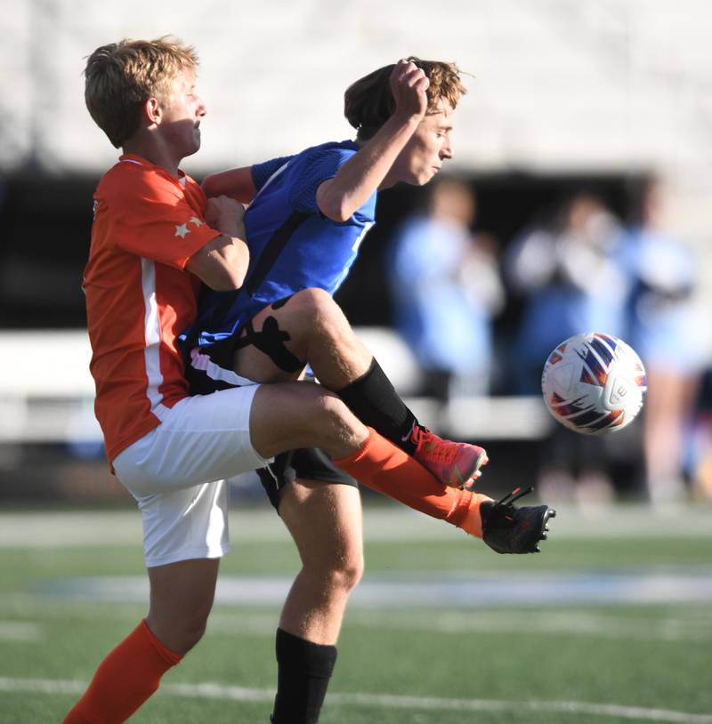John Starks/jstarks@dailyherald.com
St. Charles East’s Connor Brown and St. Charles North’s Arnel Dizdarevic, right, compete for the ball in the TriCities boys soccer night game in Geneva on Tuesday, September 27, 2022.