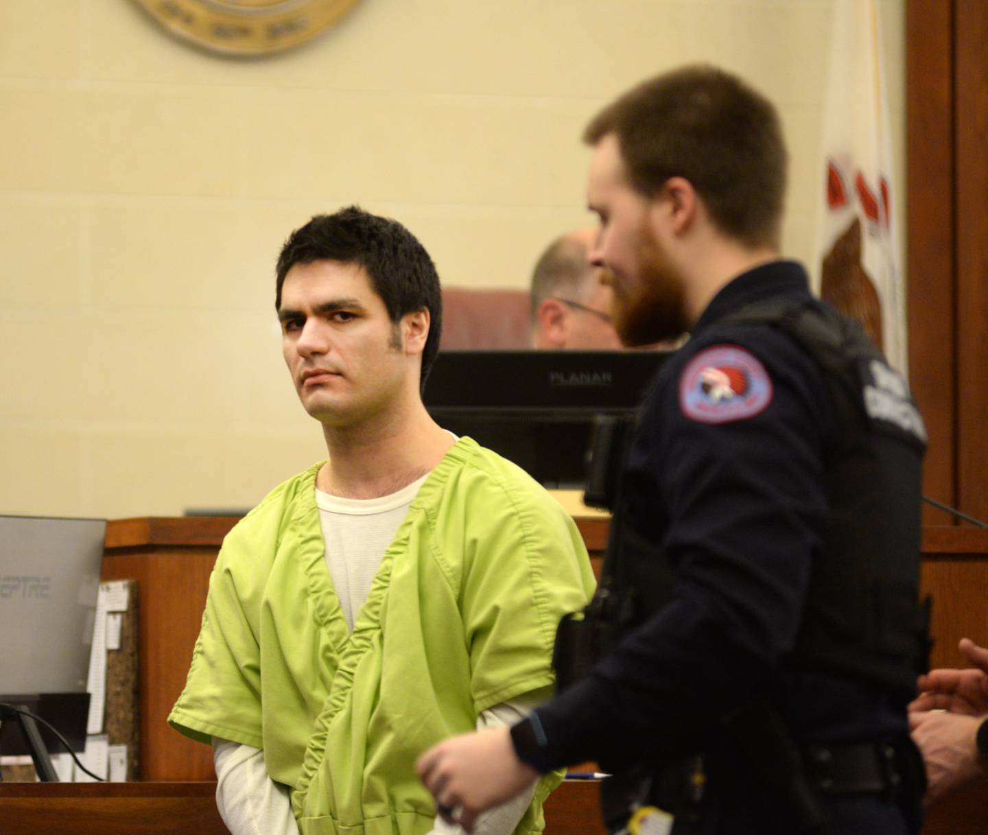 Jonathon Gounaris exits an Ogle County courtroom at the Judicial Center in Oregon on Thursday, Jan. 23, 2025. He is charged with the attempted murder of three law enforcement officers during a standoff at his rural Dixon home in June 2024. Gounaris is being held in the Winnebago County Jail as his case proceeds through the court system.