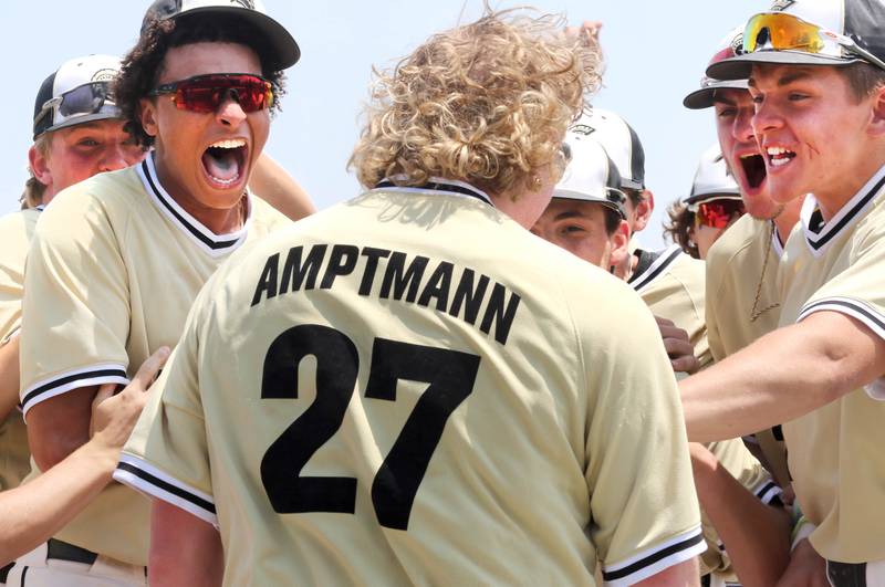 Sycamore players celebrate their Class 3A sectional final win over Burlington Central Saturday, June 3, 2023, at Kaneland High School in Maple Park.