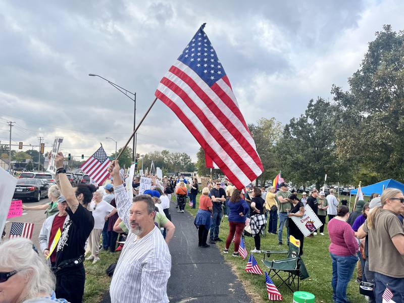 Protesters encouraged cars to honk in solidarity at the “No Kings” protest in DeKalb on Oct. 18, 2025.
