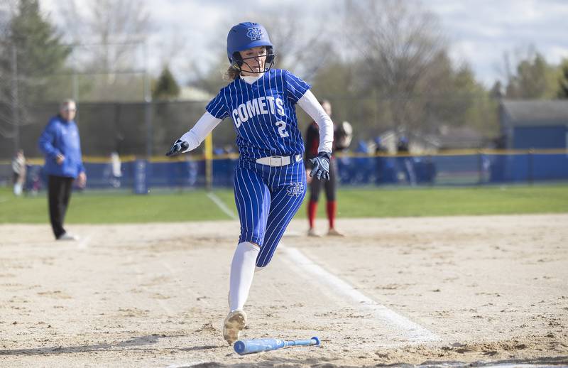 Newman’s Brenleigh Cook avoids a bat while scoring against Hall Monday, April, 21, 2025.