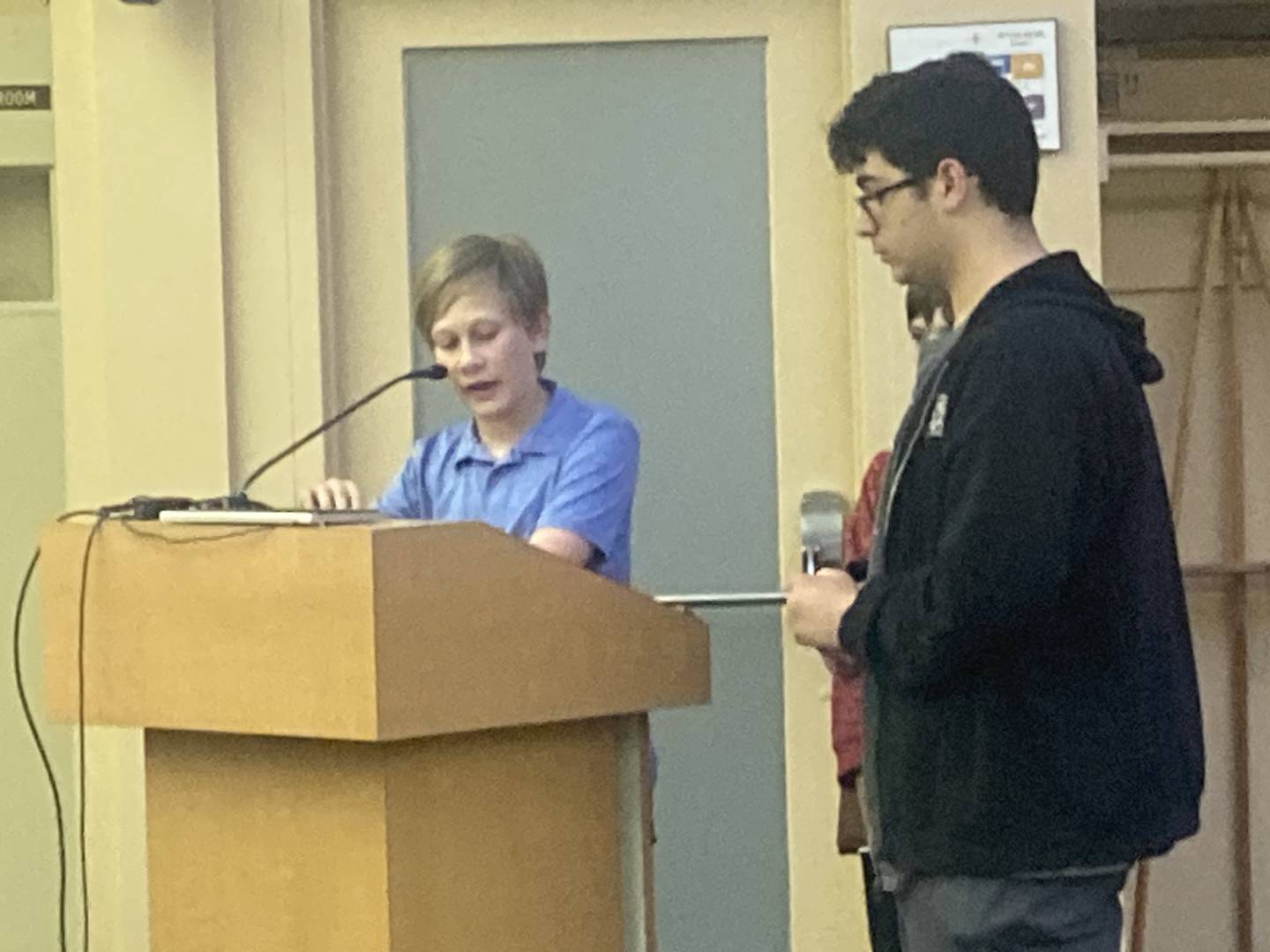 Zach Dylkiewicz presents the flag committee's designs to the Lockport Committee of the Whole