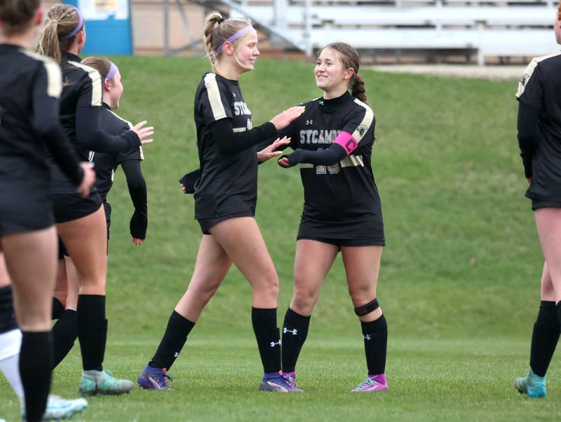 Sycamore's Kelsie Ryder (left) and Faith Schroeder celebrate a goal during their game against La Salle-Peru Wednesday, April 9, 2025, at Sycamore High School.
