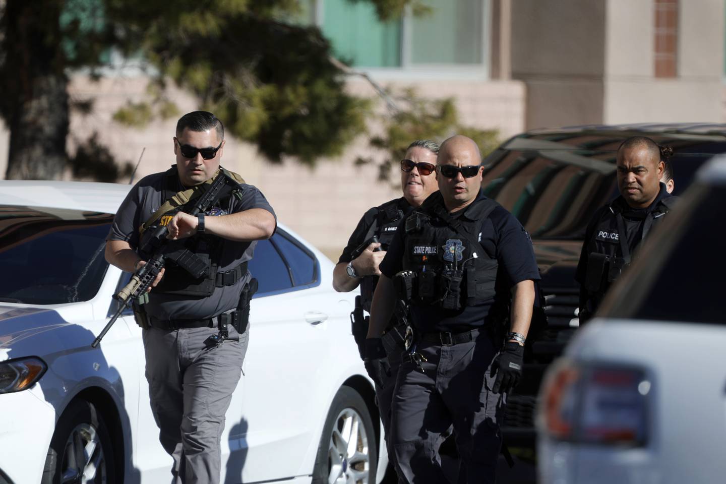 Nevada State Police officers head onto the University of Nevada, Las Vegas, campus after reports of an active shooter, Wednesday, Dec. 6, 2023, in Las Vegas.