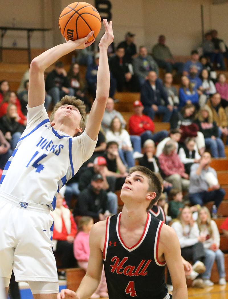 Princeton's Jackson Mason eyes the hoop over Hall's Luke Bryant on Friday, Feb. 13, 2026 at Princeton High School.