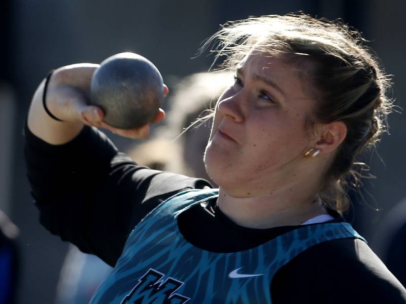 Cary-Grove’s Ashley Janeczko throws the shot putt on Friday, April 19, 2024, during the McHenry County Track and Field Meet at Cary-Grove High School.