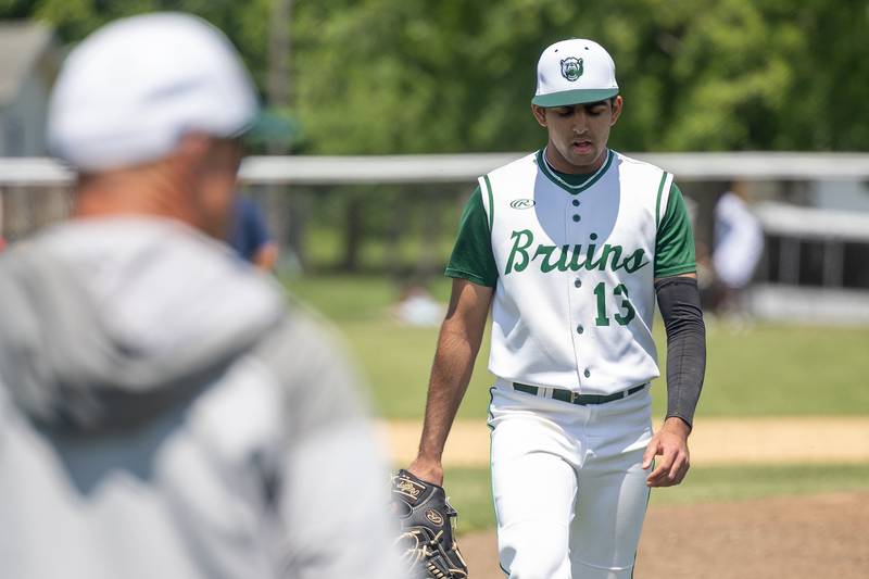 (13) Ranbir Saini of St. Bede walks to dugout after pitching on Saturday, May 24, 2025 at Stark County High School in Toulon.