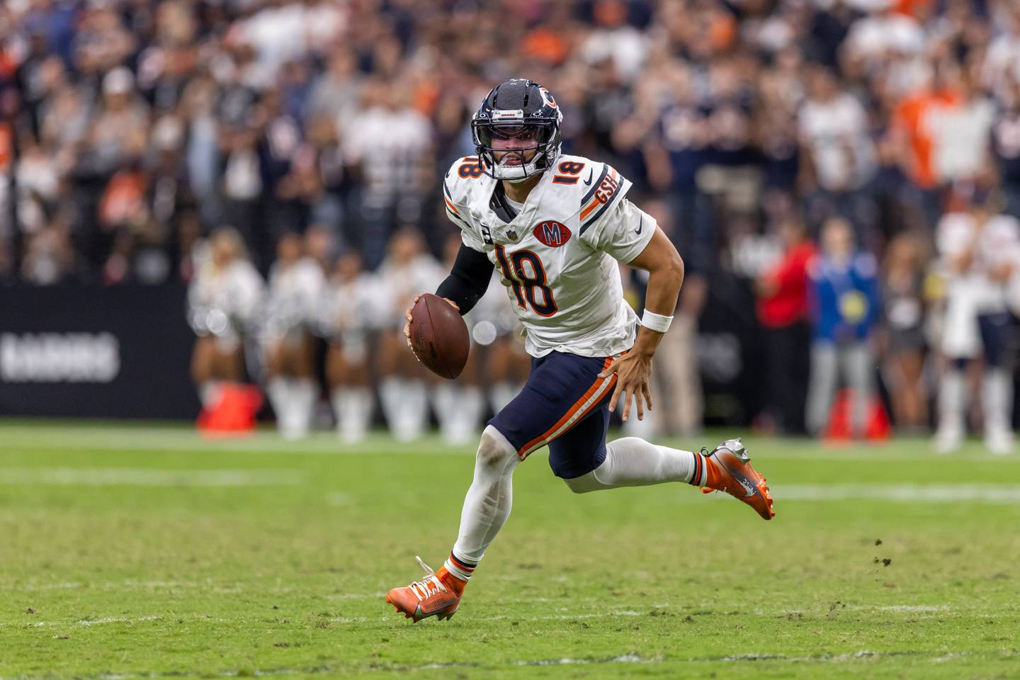 Chicago Bears quarterback Caleb Williams (18) scrambles against the Las Vegas Raiders in an NFL football game, Sunday, Sept. 28, 2025, in Las Vegas. (AP Photo/Jeff Lewis)