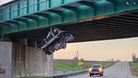 Dixon police investigate dumpster caught underneath Dixon train bridge