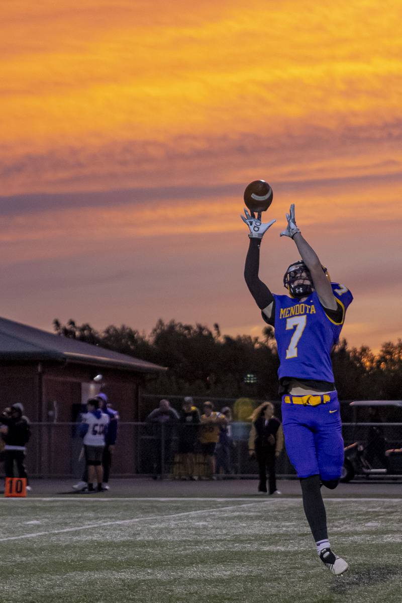 Brennan Northcutt of Mendota High School take practice throws prior to the game against Sherrard High School at Mendota High School on September 27, 2024.