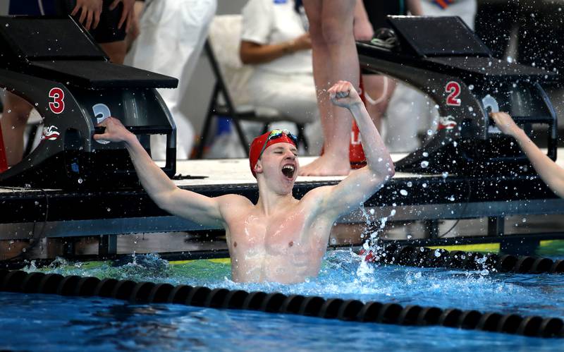 Hinsdale Central’s Frankie Adamo celebrates following the 400-yard freestyle relay championship heat during the IHSA Boys State Championships on Saturday, March 1, 2025 at the FMC Natatorium in Westmont.