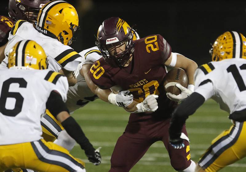 Richmond-Burton's Luke Johnson looks for running rum against the St. Laurence defense during an IHSA Class 4A first-round football game on Friday, Nov. 1, 2024, at Richmond-Burton High School in Richmond.