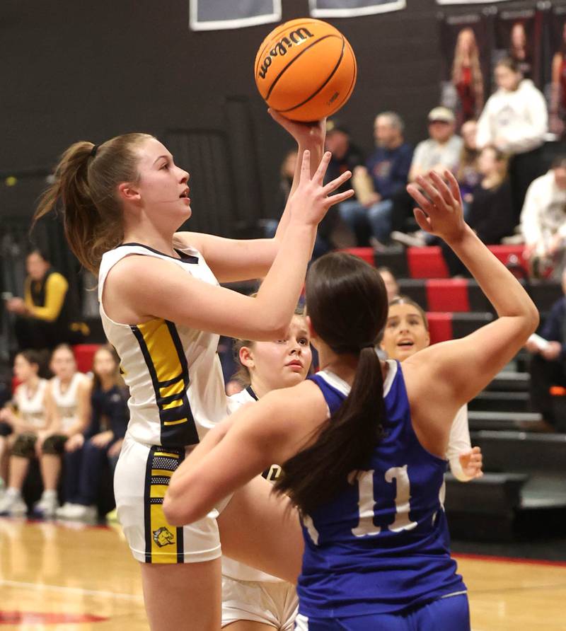 Yorkville Christian's Payton Wallin shoots over Hinckley-Big Rock's Raven Wagnernduring their Class 1A regional game Tuesday, Feb. 17, 2025, at Indian Creek High School in Shabbona.
