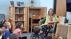 Local author Lee reads at Monroe Center School