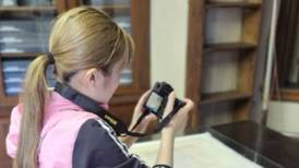 Japanese graduate student studies rare Buddhist paintings at Hegeler Carus Mansion
