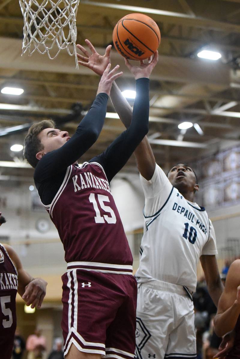 Kankakee's Eli Cunningham, left, looks to put back an offensive rebound as DePaul Prep's Blake Choice defends during a game at the Team Rose Shootout at Mount Carmel Sunday, Dec. 14, 2025.