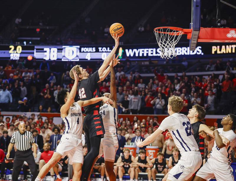 BenetÕs Colin Stack (42) is found with two seconds left to send him to the foul line and put Benet ahead of DePaul College Prep in the last seconds of the IHSA Class 4A boys basketball state semifinal Friday, March 13, 2026 at the State Farm Center in Champaign.