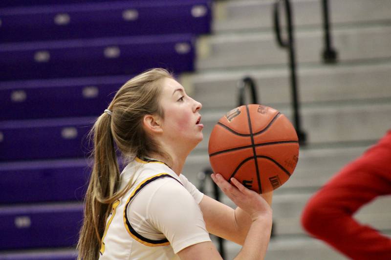 Sterling's Olivia Melcher (12) lines up a free throw in the first half of Wednesday's game at Dixon KSB Holiday Classic. Melcher had 15 points to lead Sterling. Rockford Jefferson won the game 41-37.