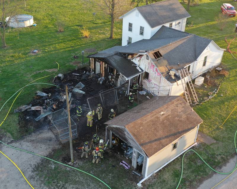 Firefighters from Utica, Spring Valley, Peru, Troy Grove and others responded to a 3300 block of East 11th Road in Waltham Township on Wednesday, April 12, 2023 north of Utica. A mutual aid box alarm was called for fire departments after the fire began shortly after 6p.m