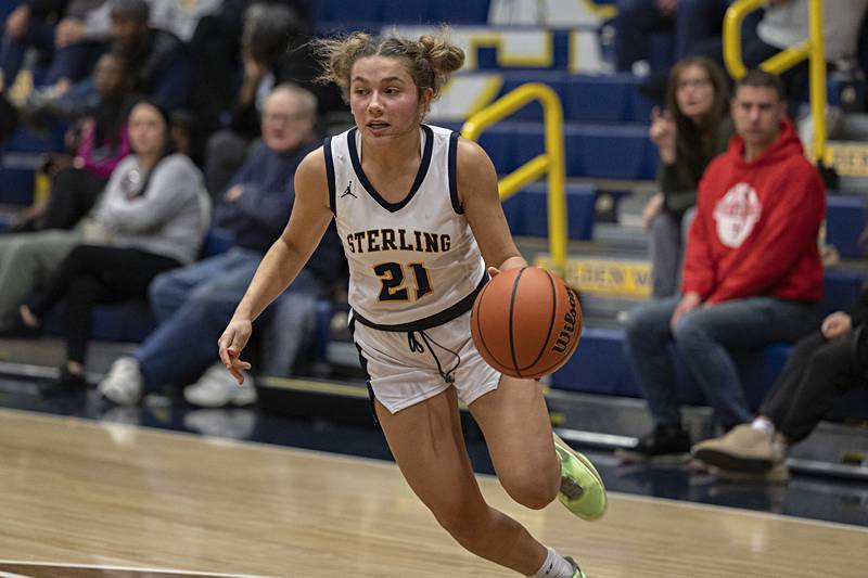 Sterling’s Jae James drives to the hoop against Geneseo Thursday, Dec. 7, 2023 at Sterling High School.